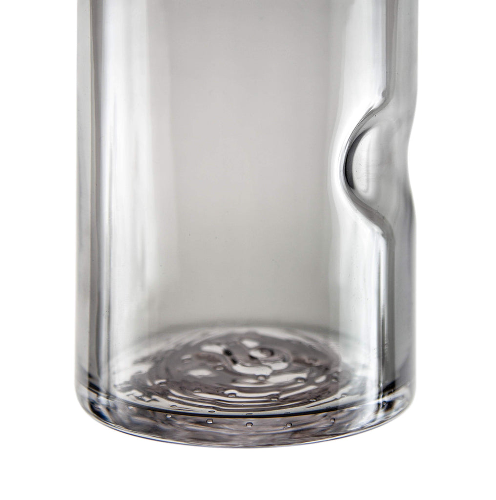 Detailed shot of the unique ergonomic thumb divot on a Tundra Series Drinking Glass, enhancing grip and comfort.