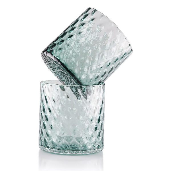 Deco Collection artisan glasses in sea foam green, set against a light, neutral background to emphasize the color's vibrancy.
