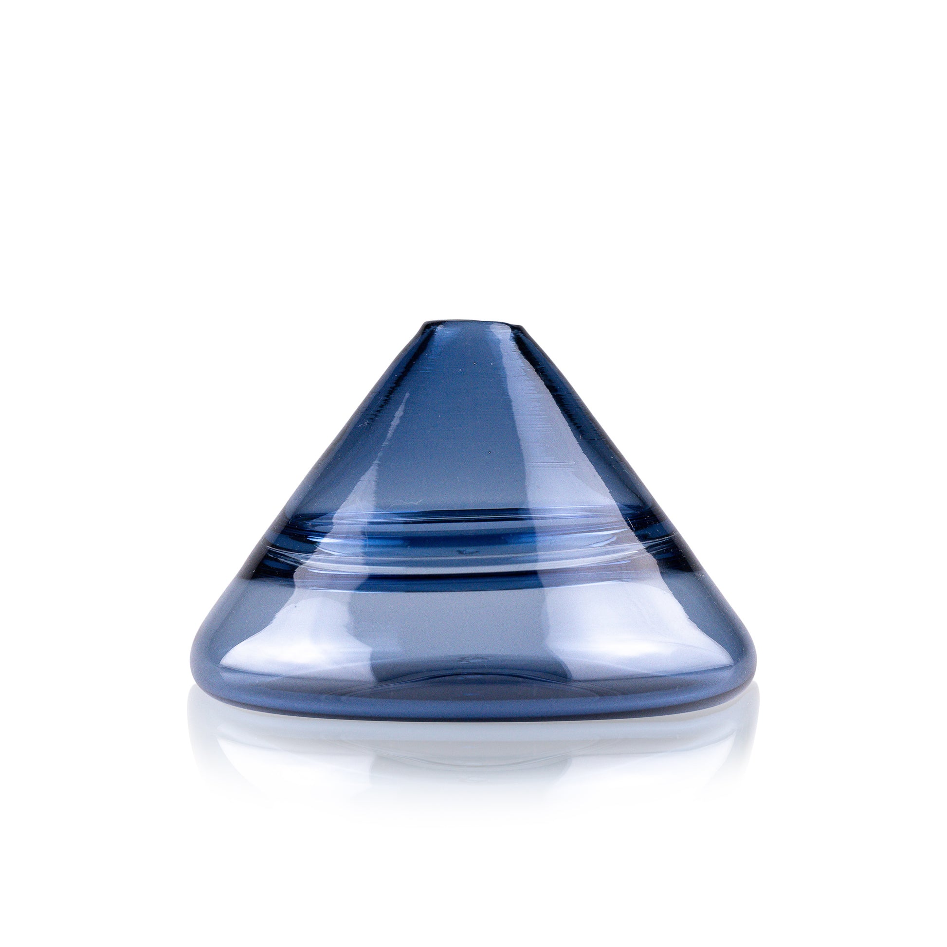 Unconventional halo vase with a conical shape, arranged in a staggered formation and reflected on a glossy surface, highlighting their sleek and contemporary design.