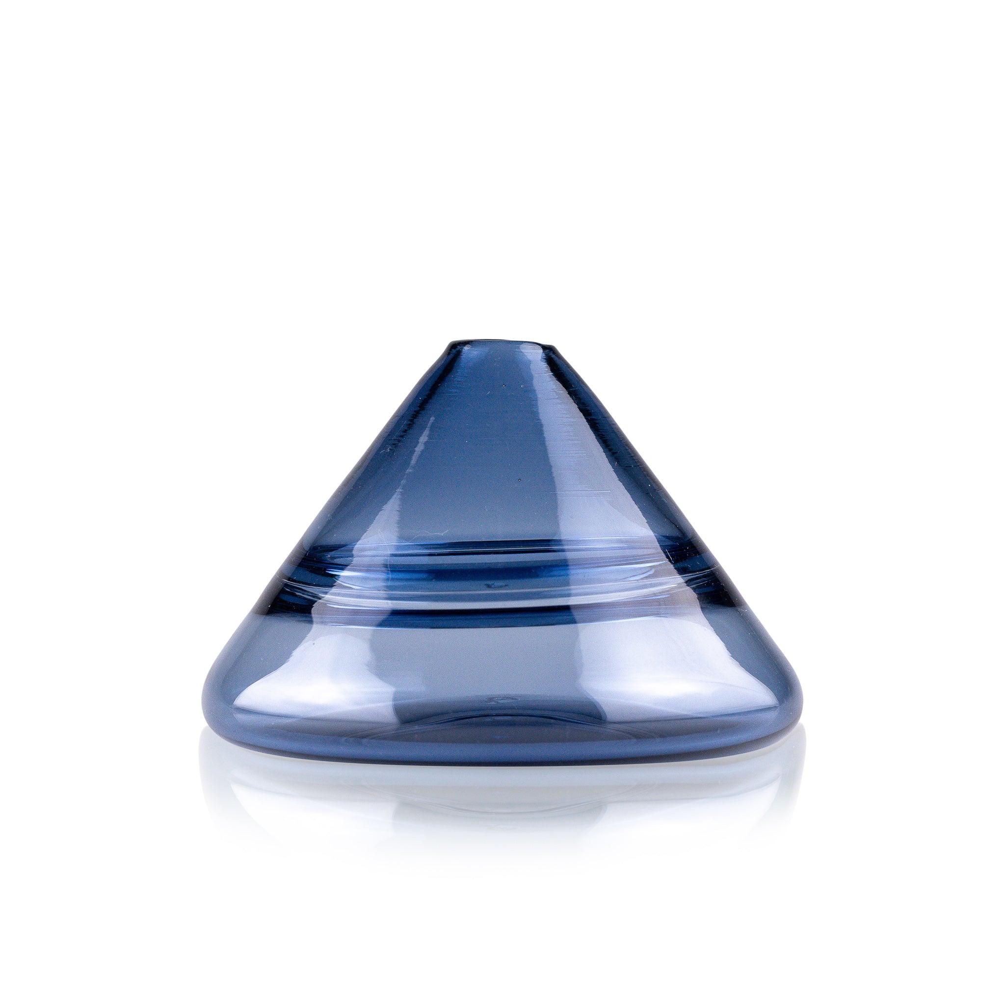 Unconventional halo vase with a conical shape, arranged in a staggered formation and reflected on a glossy surface, highlighting their sleek and contemporary design.