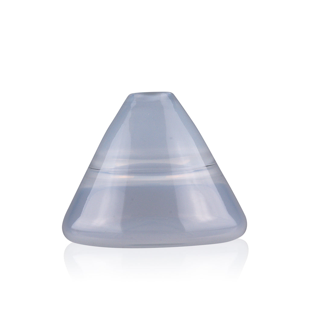 Unconventional halo vase with a conical shape, arranged in a staggered formation and reflected on a glossy surface, highlighting their sleek and contemporary design.
